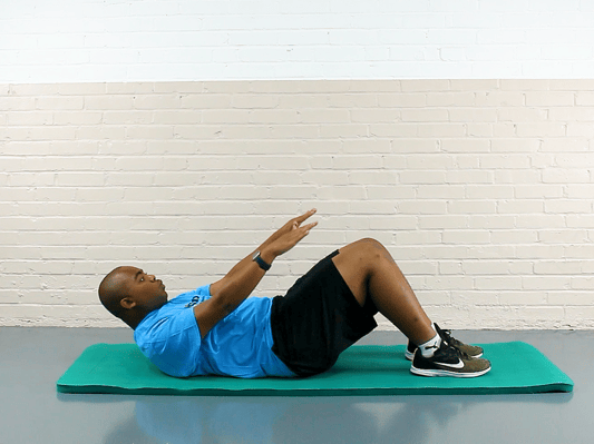 Individual doing core crunches exercise